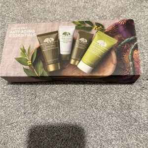 Origins Skincare Set with Green and White Tubes